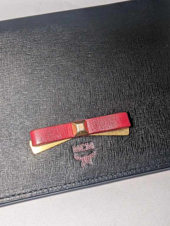 MCM Small Black with Red and Gold Bow Accent Clutch with Crossbody Strap