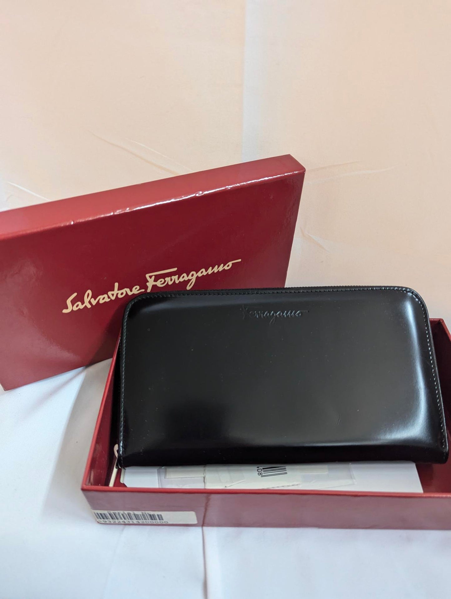 Ferragamo Black Zippy Wallet in Box