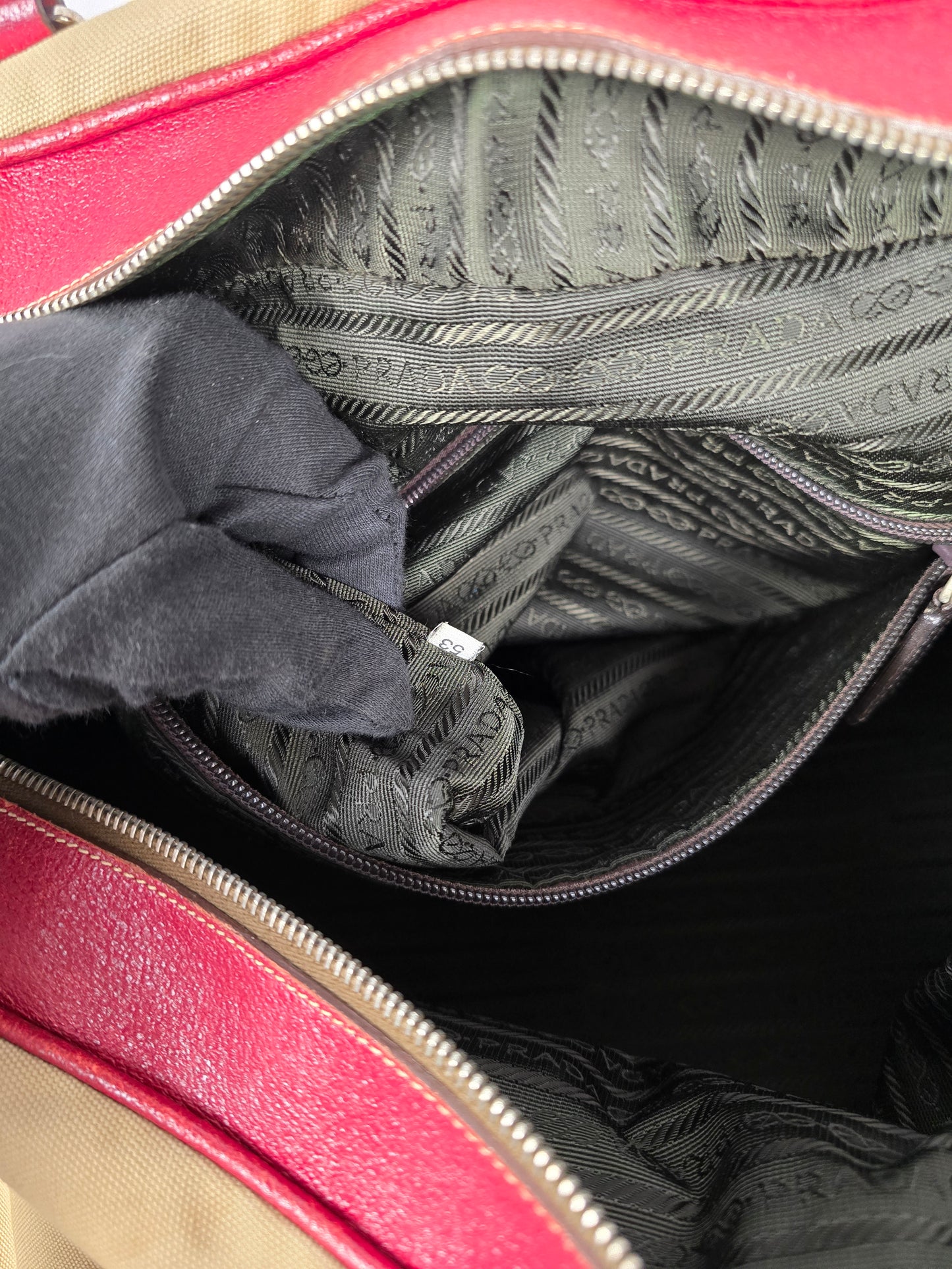 Prada Duffle Bag with Red Leather Trim