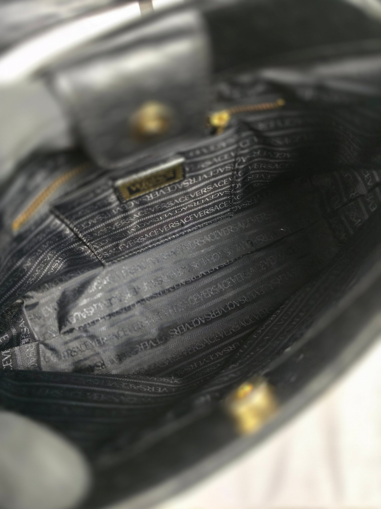 Gianni Versace Logo Sunburst Shoulder Bag in Black Ostrich Leather