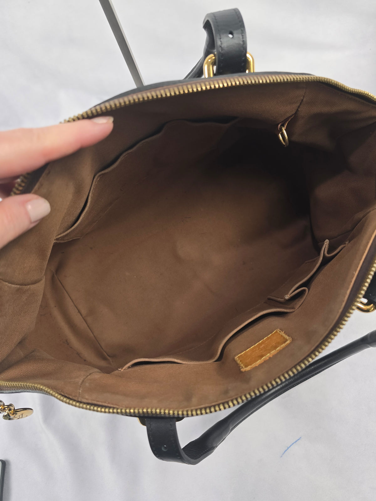 Louis Vuitton Monogram Tivoli (black-dyed vachetta trim and handles)