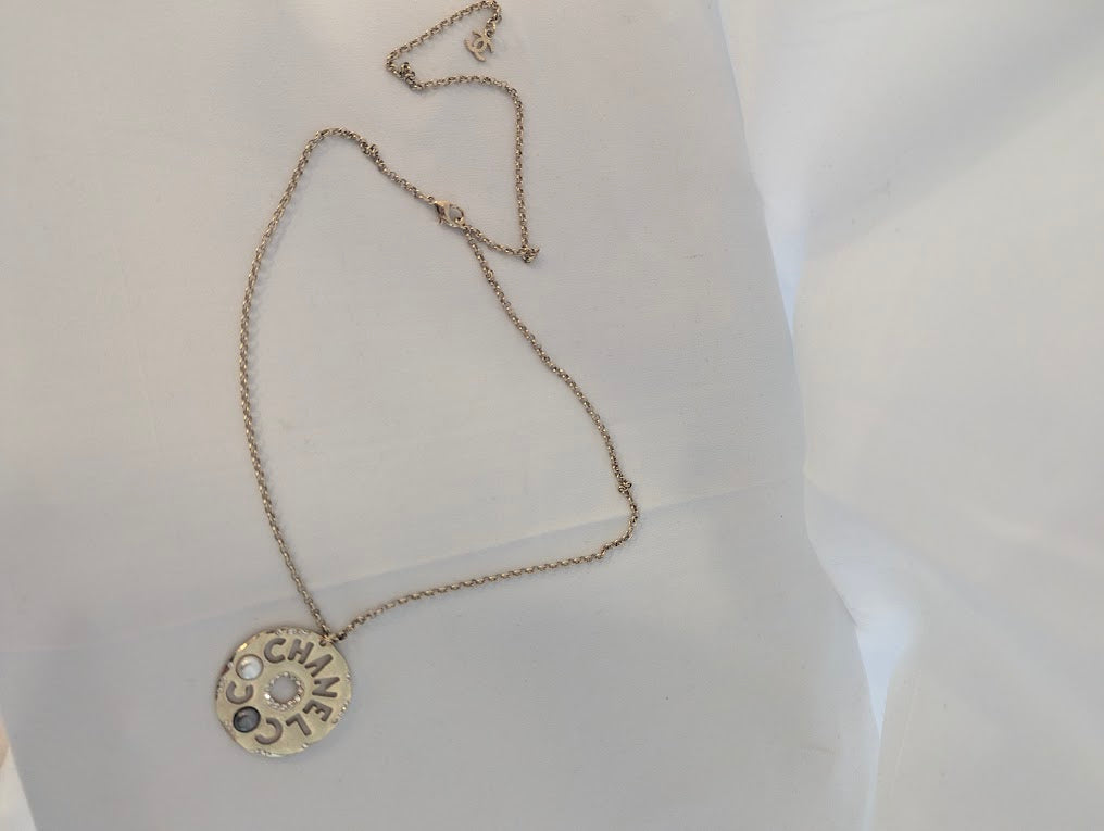 Chanel Pearl Embellished Logo Medallion Necklace