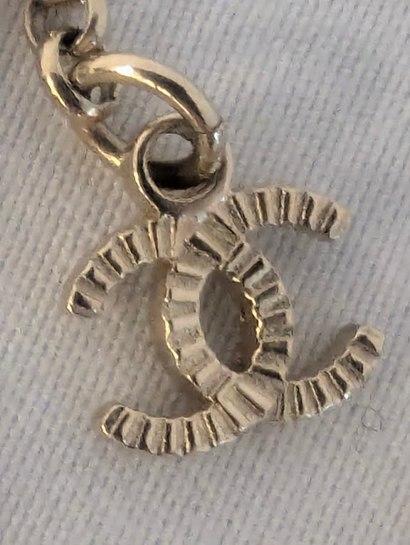 Chanel Pearl Embellished Logo Medallion Necklace