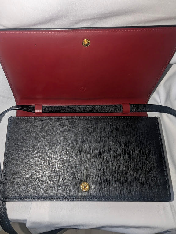 MCM Small Black with Red and Gold Bow Accent Clutch with Crossbody Strap