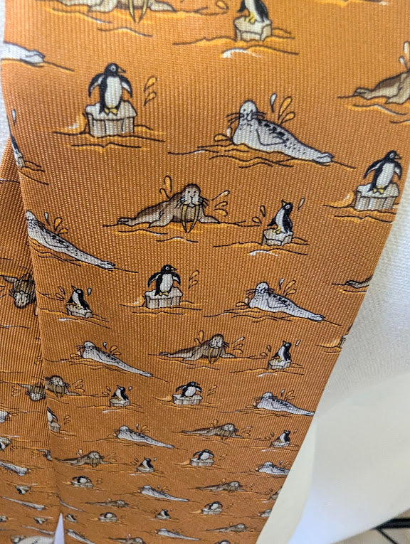 Ferragamo Orange Silk Seal and Penguin Men's Tie