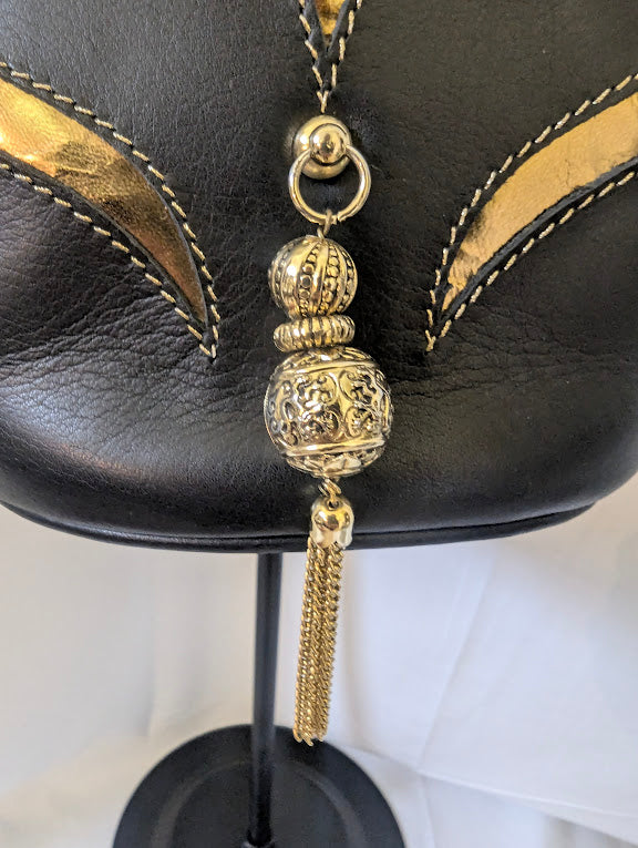 Bally Black and Gold Leather Handbag