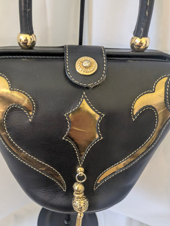 Bally Black and Gold Leather Handbag