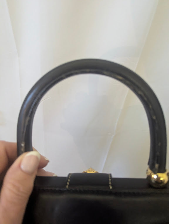 Bally Black and Gold Leather Handbag