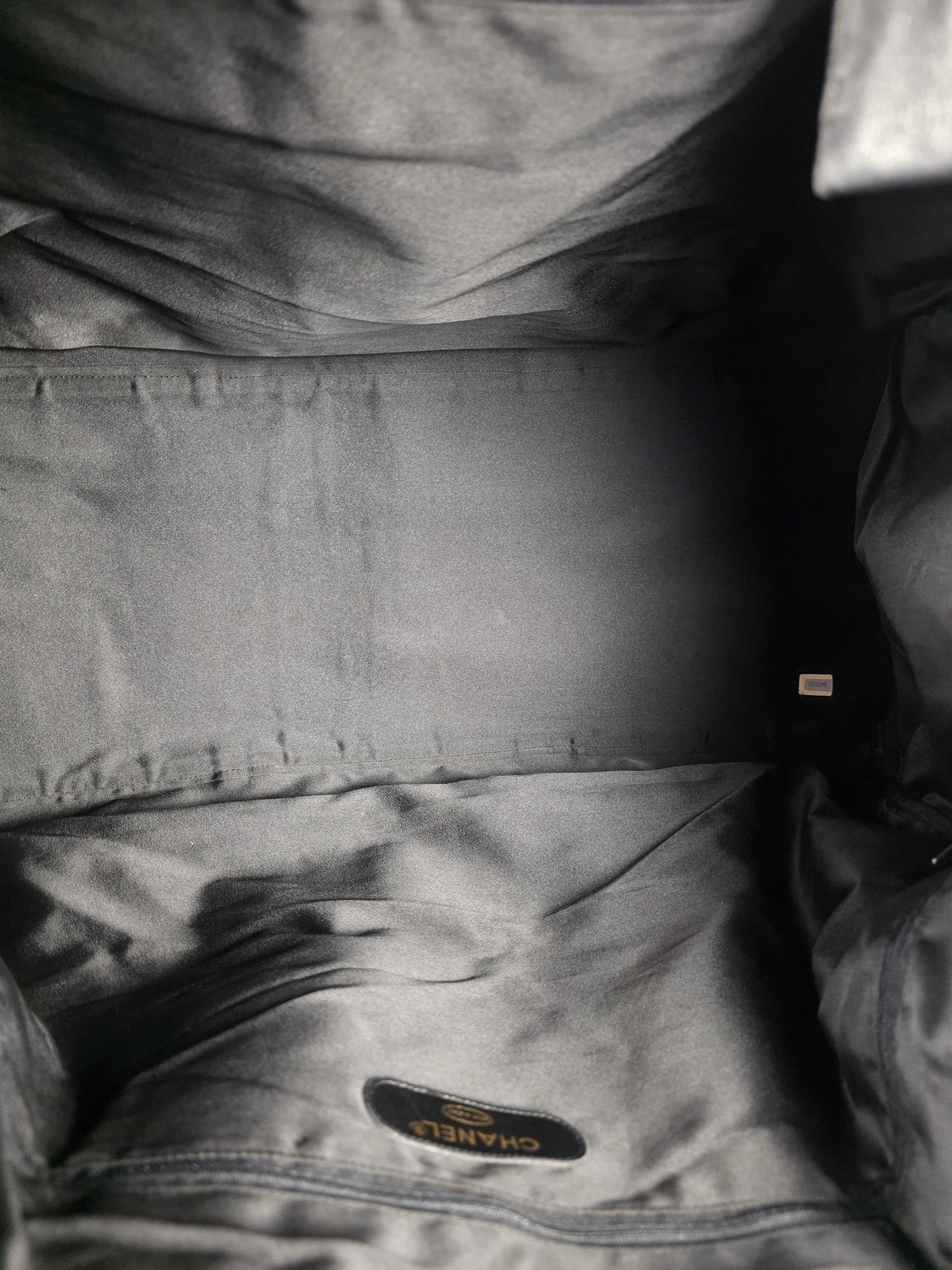 CHANEL VINTAGE & RARE DIAMOND QUILTED LAMBSKIN BLACK TRAVEL BAG, SIZE 60CM