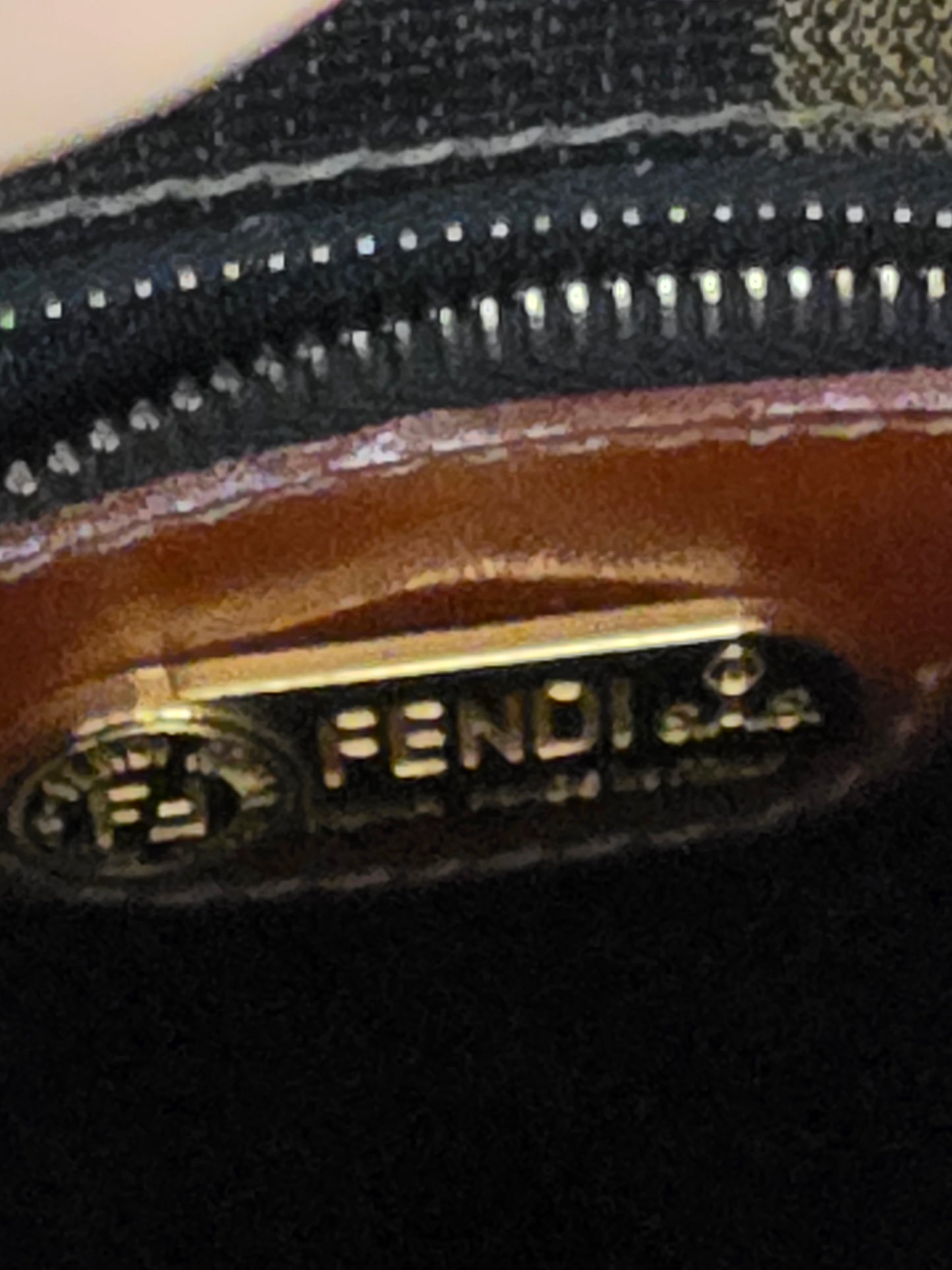 FENDI PEQUIN STRIPED SLING BACKPACK