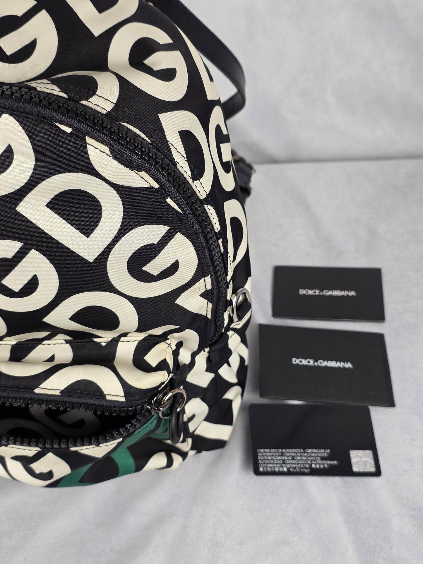 DOLCE & GABANNA DG LOGO PRINT NYLON BACKPACK, BLACK AND WHITE