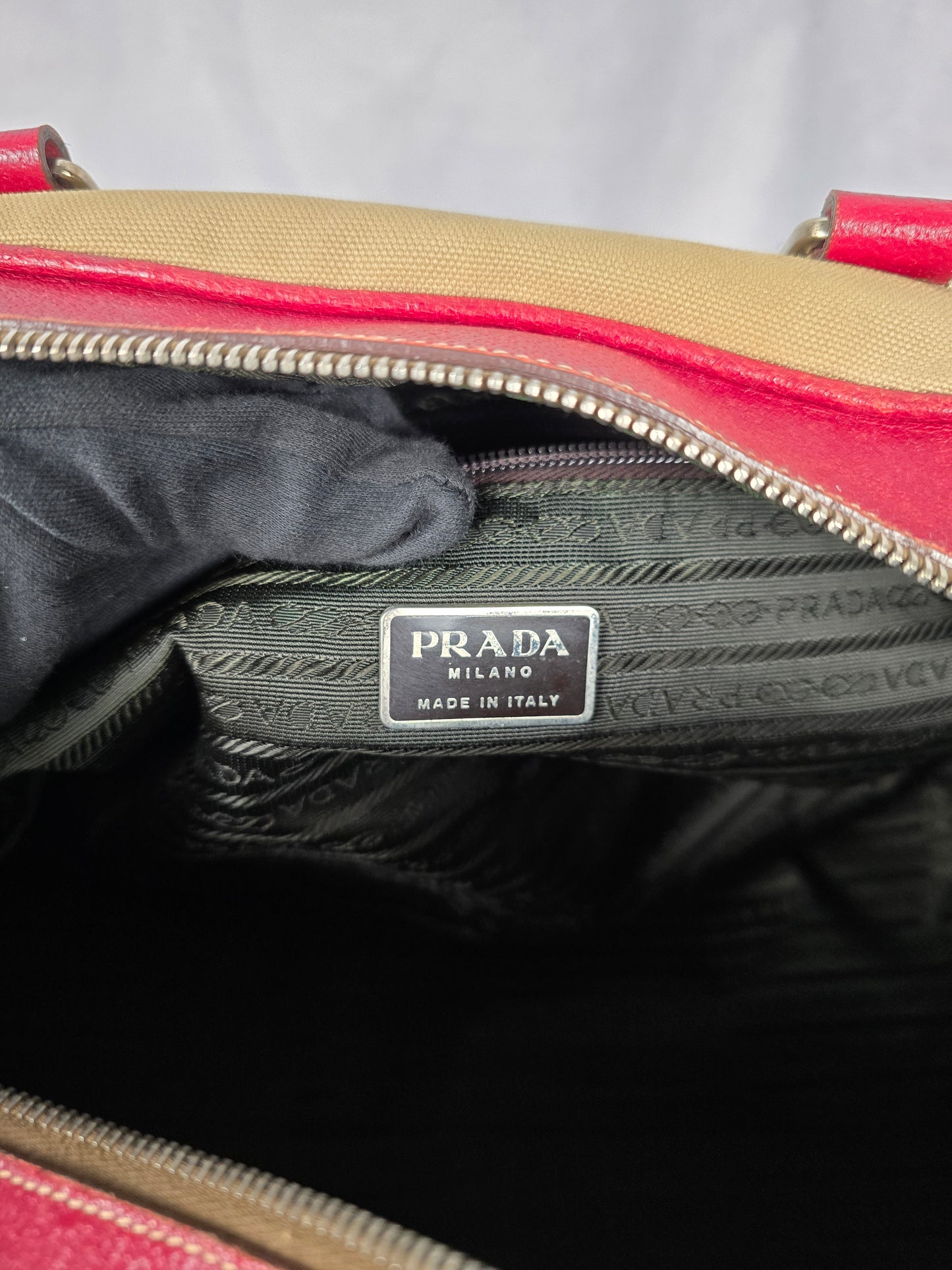 Prada Duffle Bag with Red Leather Trim