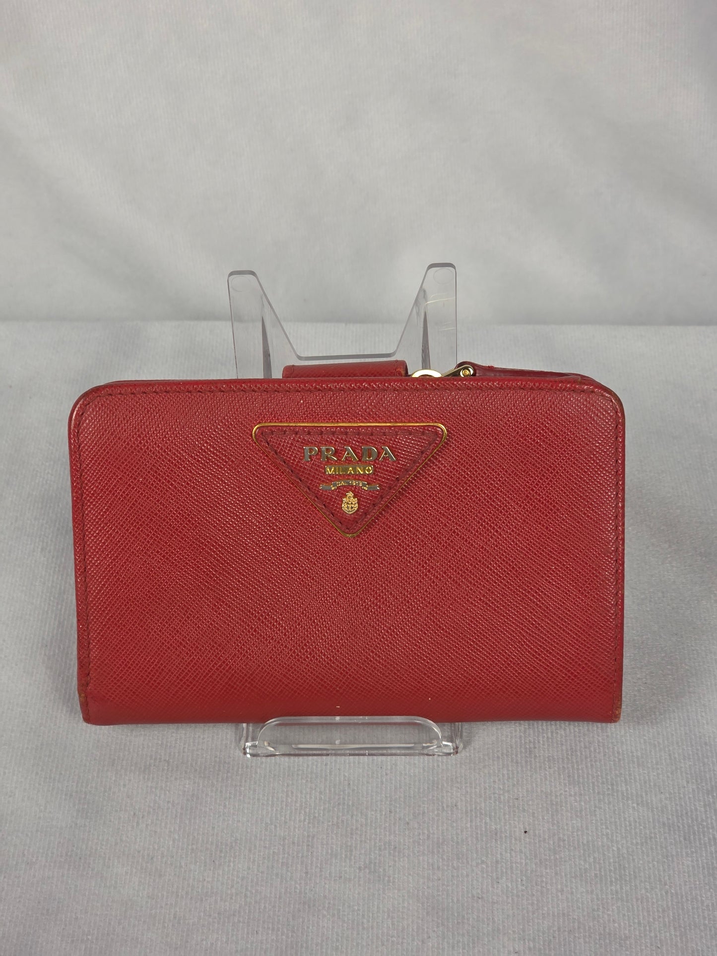PRADA SAFFIANO RED TRIANGLE MOTIF ZIP/BIFOLD WALLET