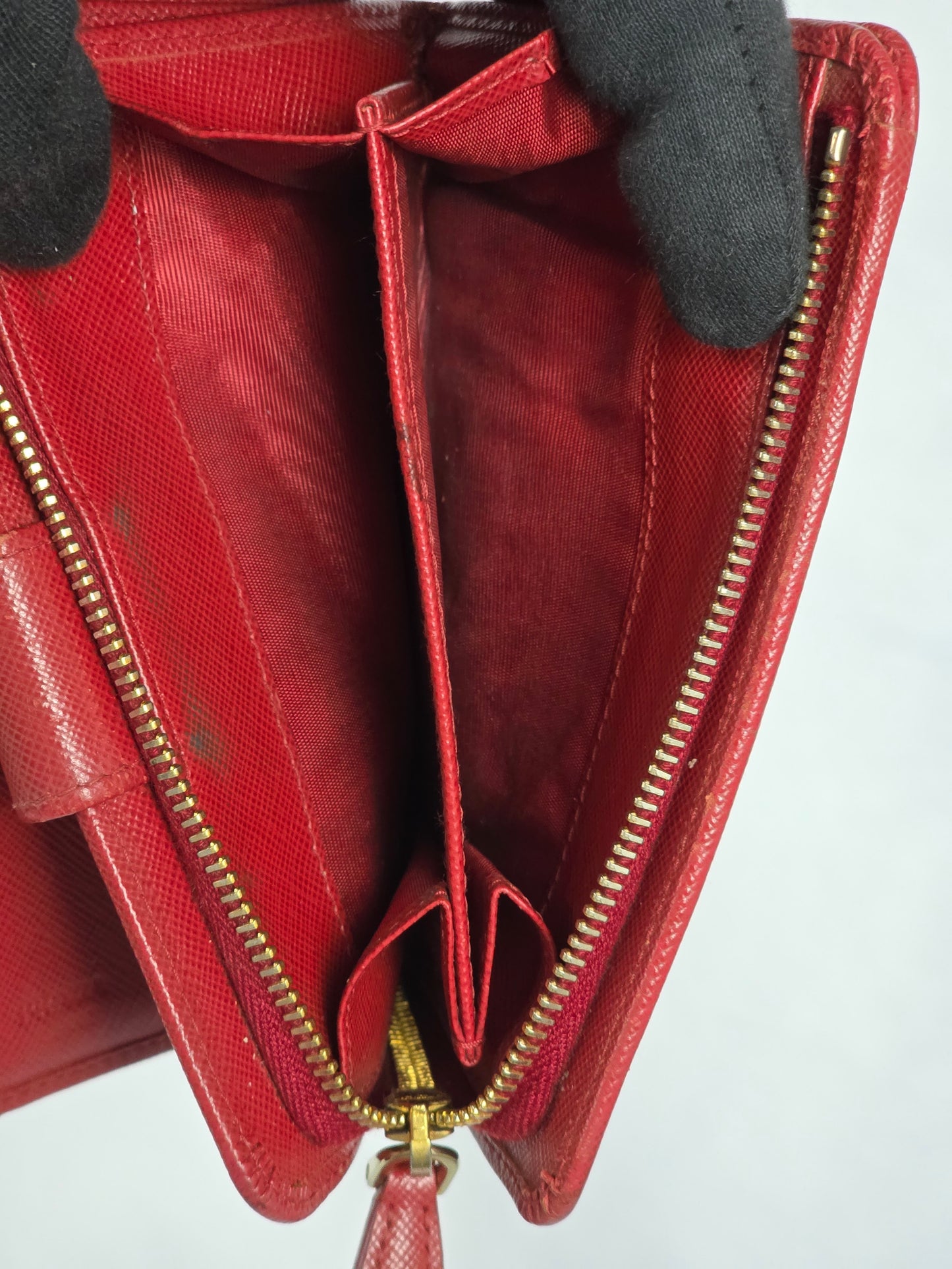 PRADA SAFFIANO RED TRIANGLE MOTIF ZIP/BIFOLD WALLET