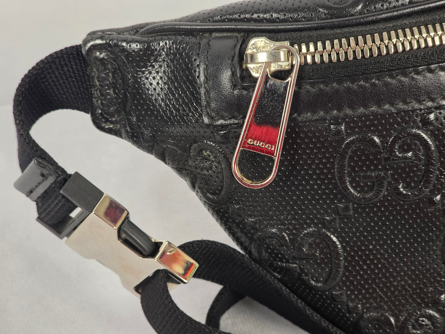 GUCCI EMBOSSED GG BLACK BELT BAG