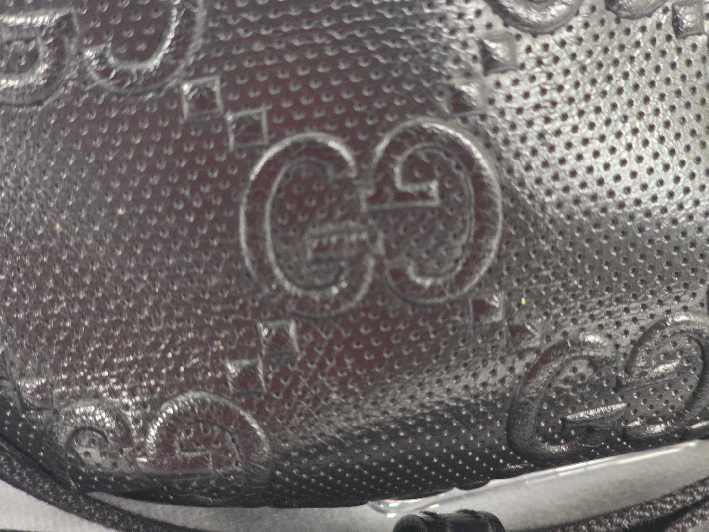 GUCCI EMBOSSED GG BLACK BELT BAG