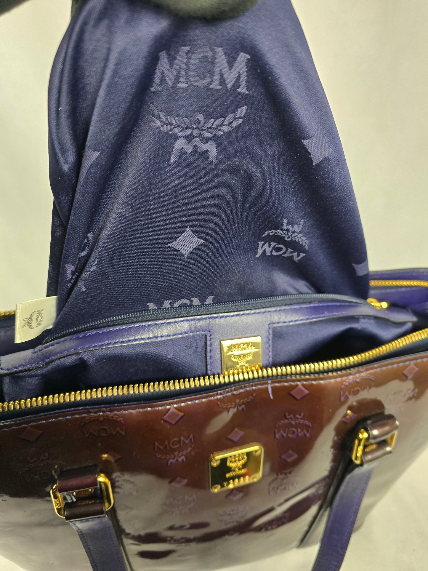 MCM Amarante Visetos Patten Leather Tote in a Brown/Purple