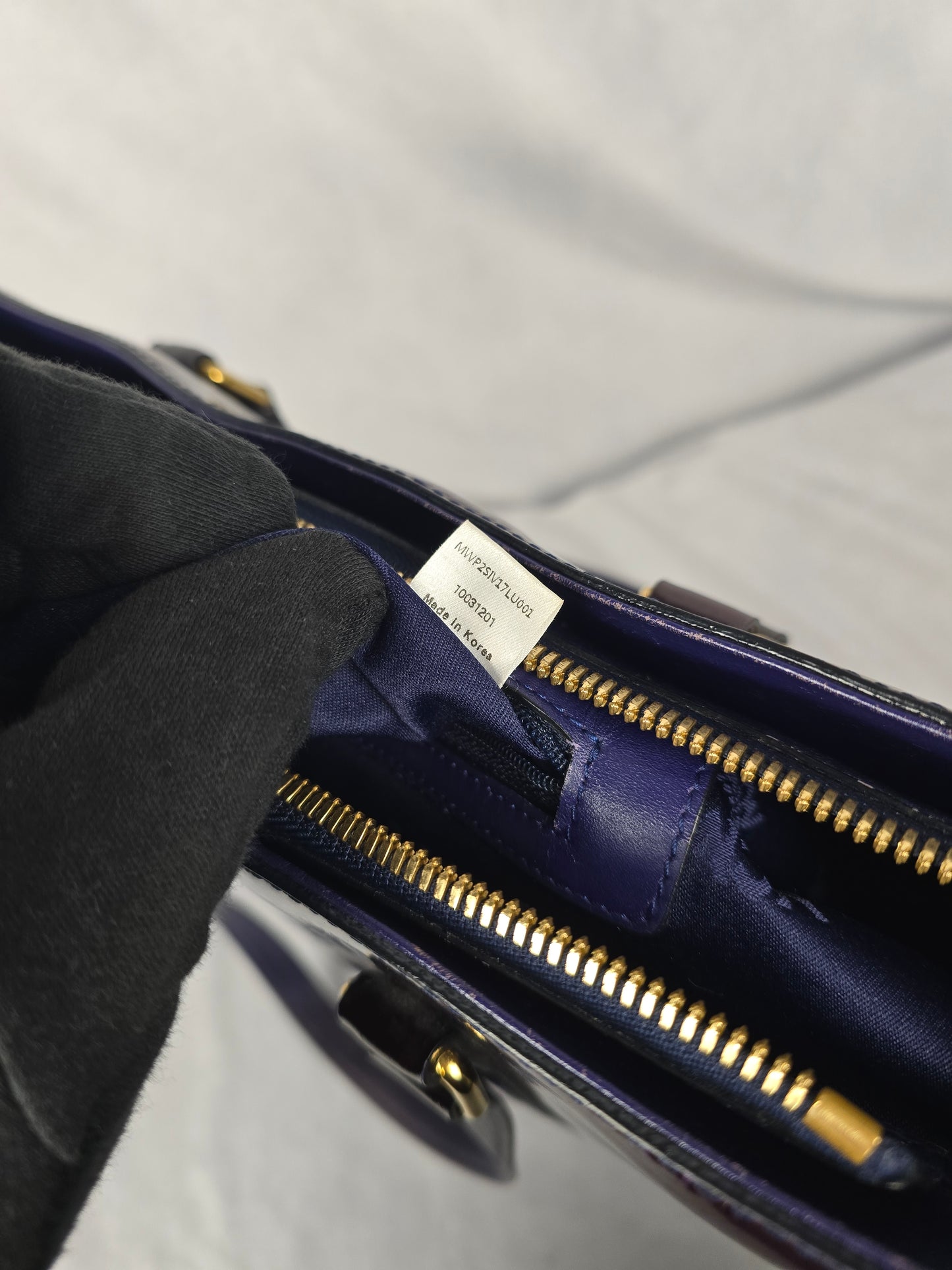 MCM Amarante Visetos Patten Leather Tote in a Brown/Purple