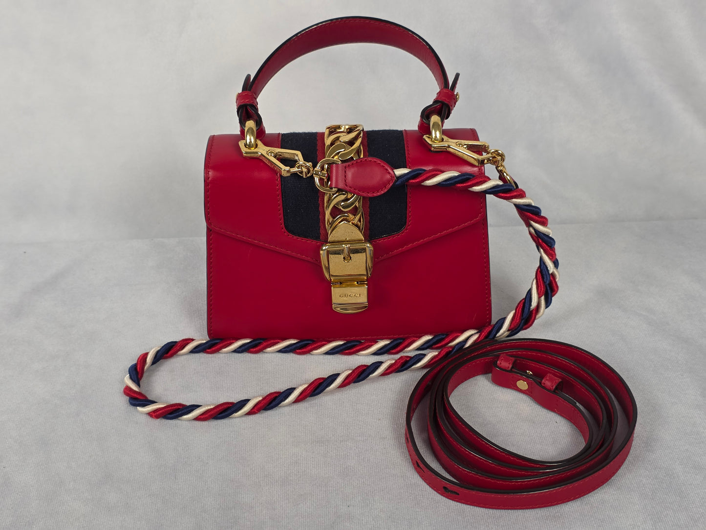 Gucci Red Leather Mini Sylvie Top Handle Bag, Featuring Two Straps