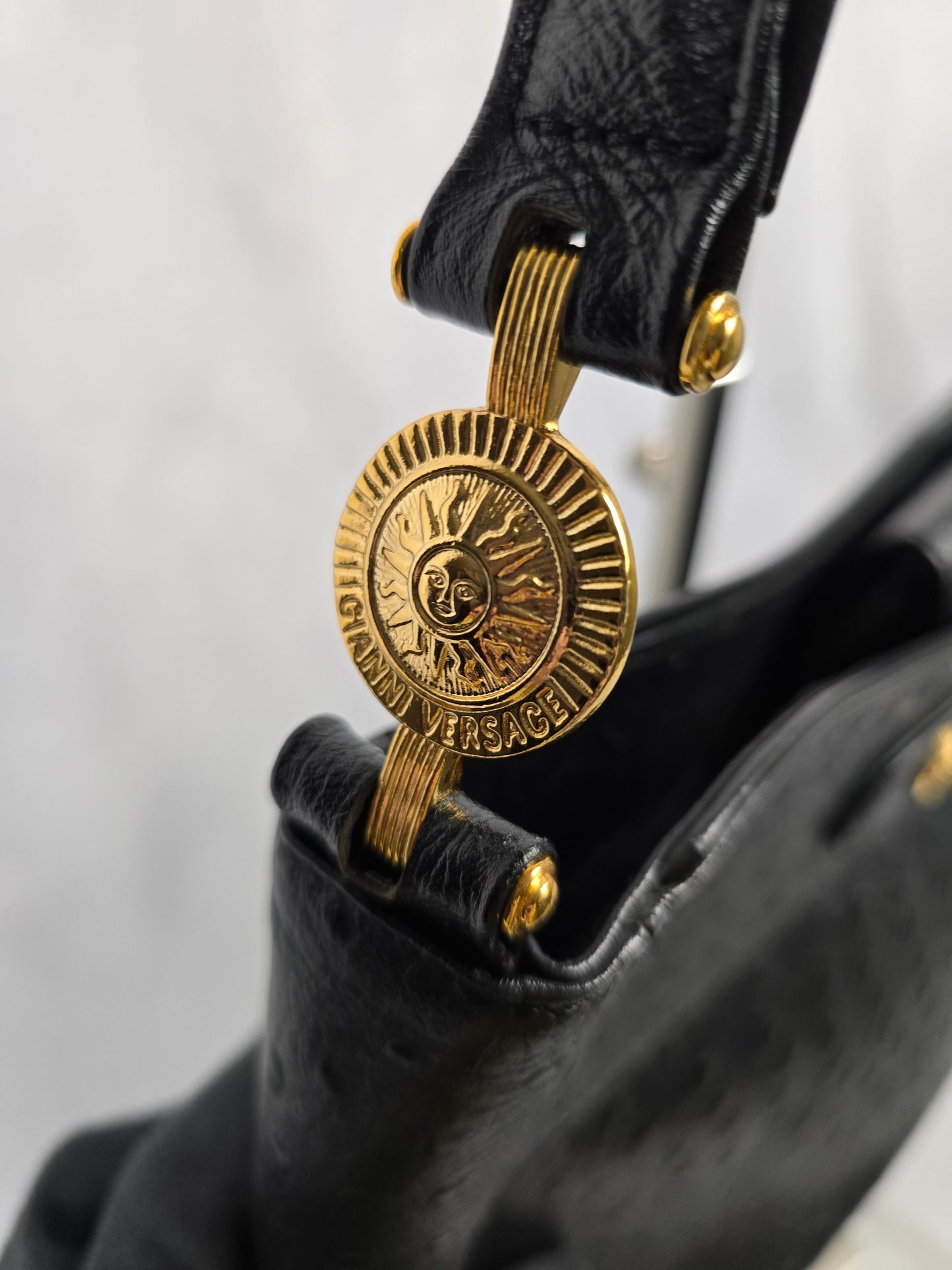 Gianni Versace Logo Sunburst Shoulder Bag in Black Ostrich Leather