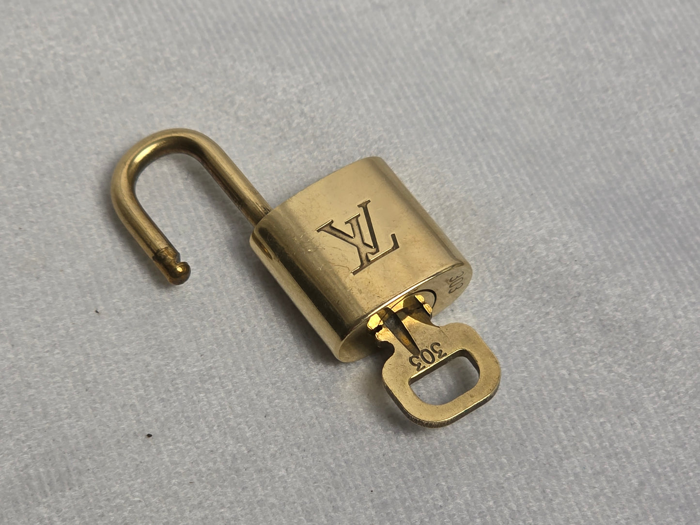 LOUIS VUITTON LOCK AND KEY, SERIES #300