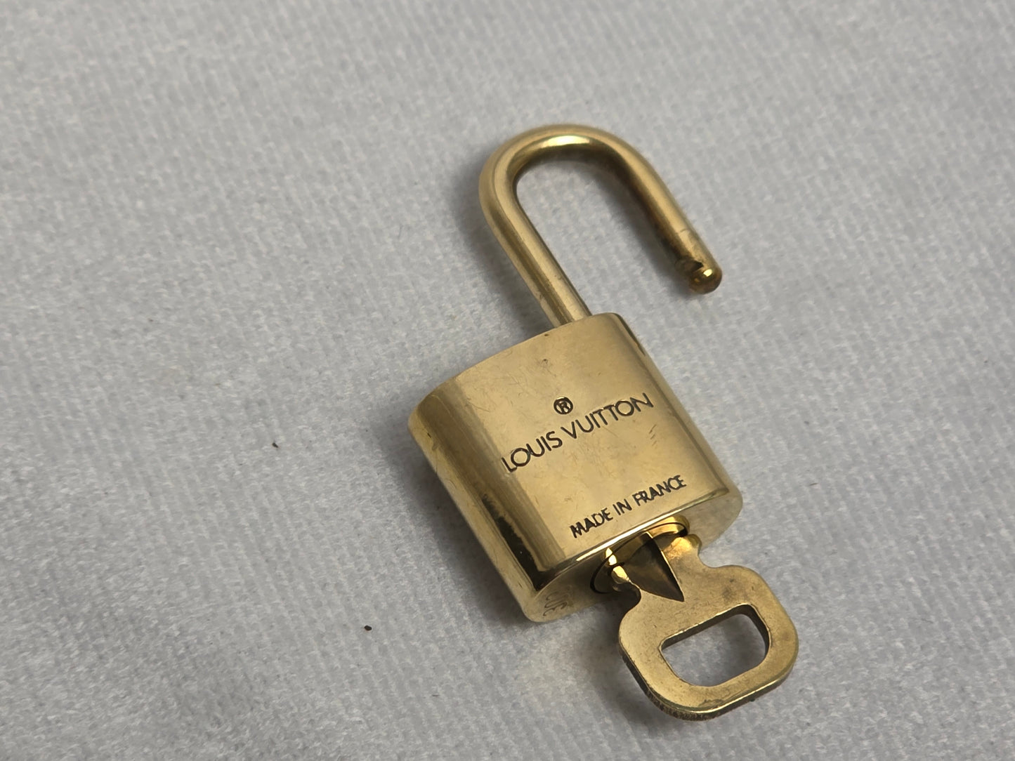 LOUIS VUITTON LOCK AND KEY, SERIES #300