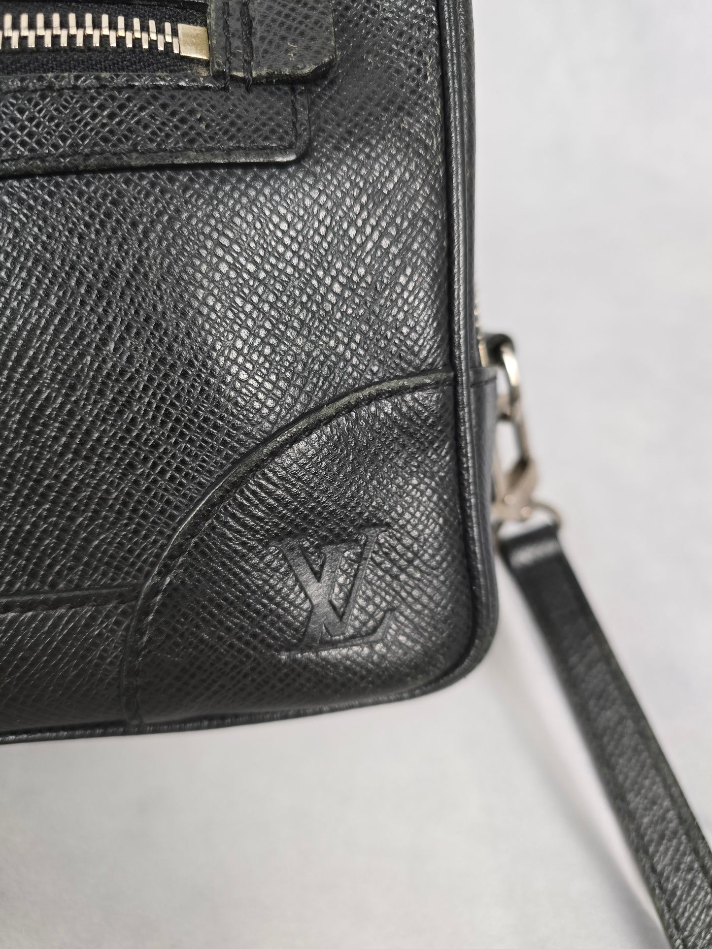 Louis Vuitton Pavel Taiga Leather Clutch