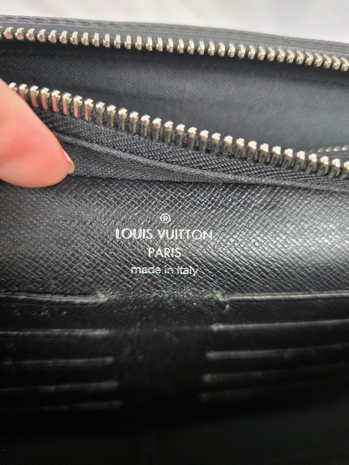Louis Vuitton Pavel Taiga Leather Clutch