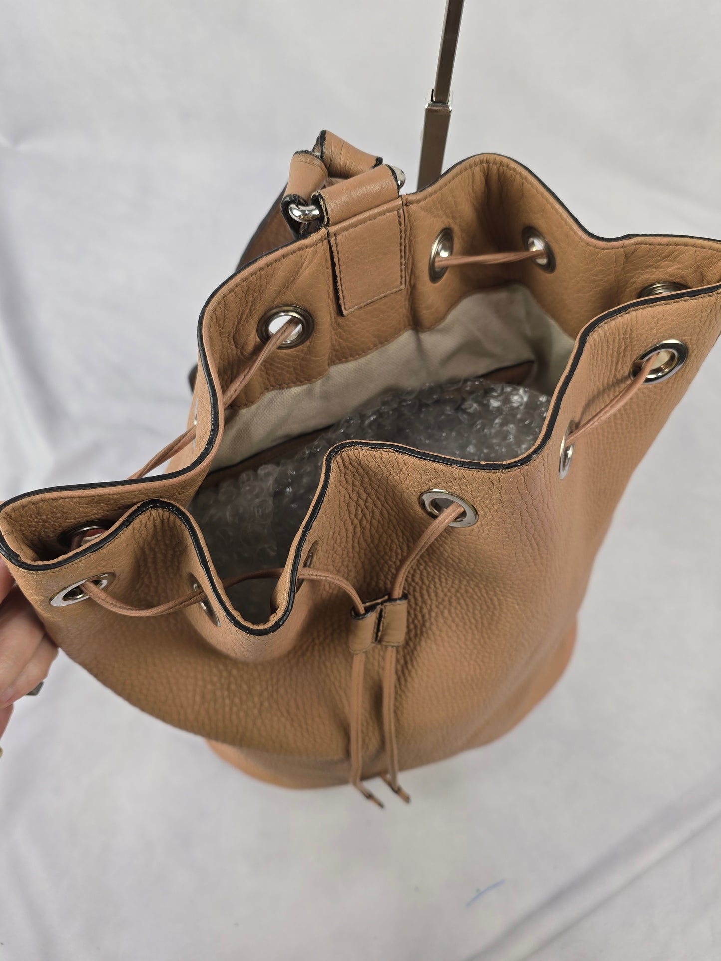 Gucci Soho Pebbled Leather Drawstring Backpack in Tan