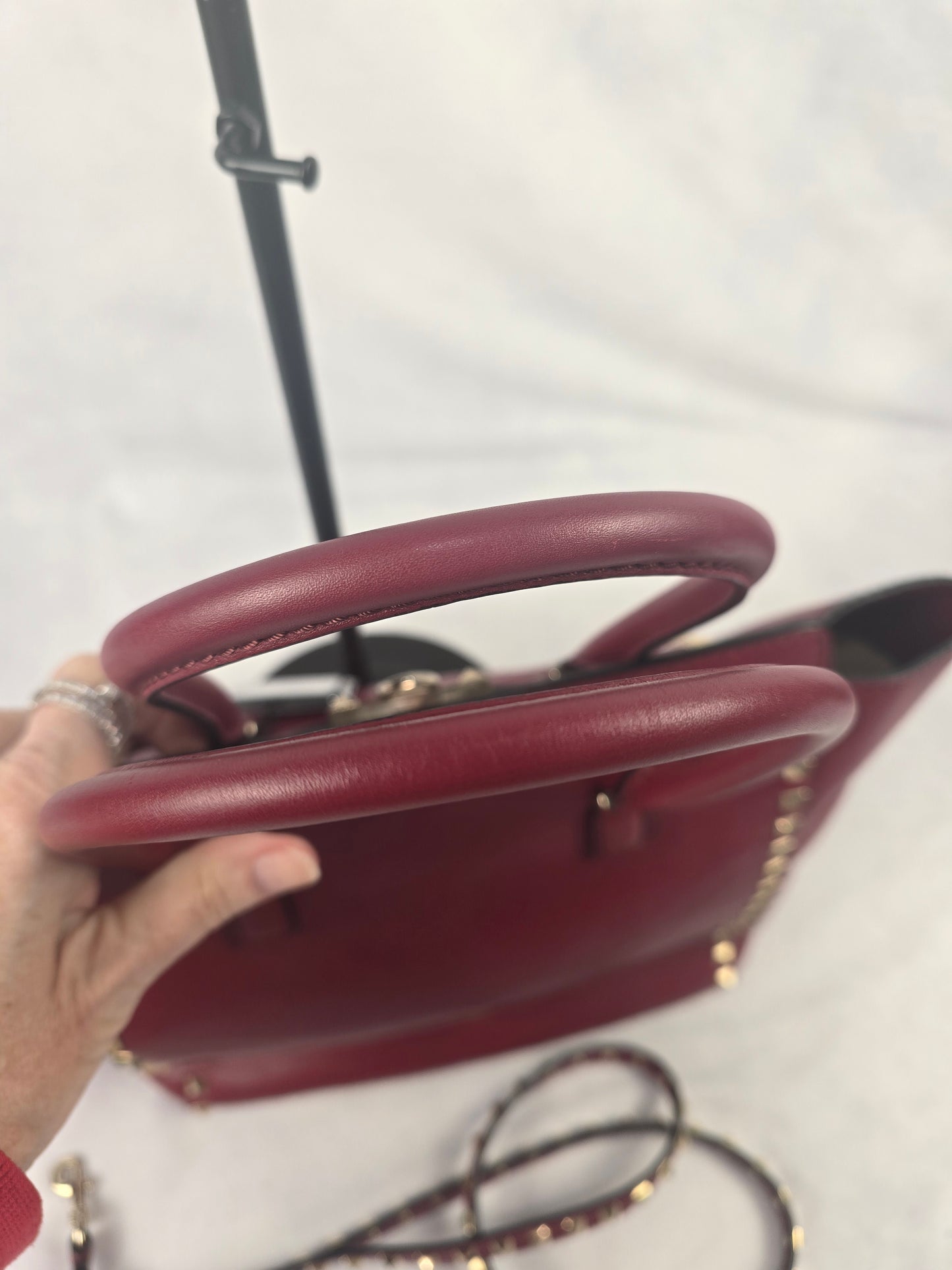 Valentino Garavani Leather Rockstud Two Way Bag in Dark Red