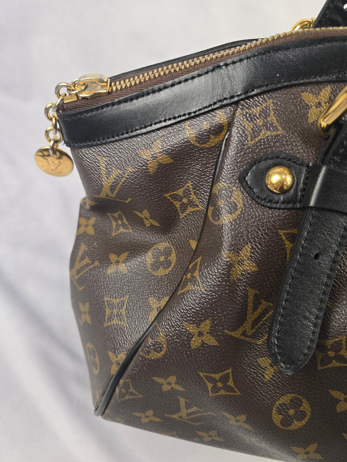 Louis Vuitton Monogram Tivoli (black-dyed vachetta trim and handles)
